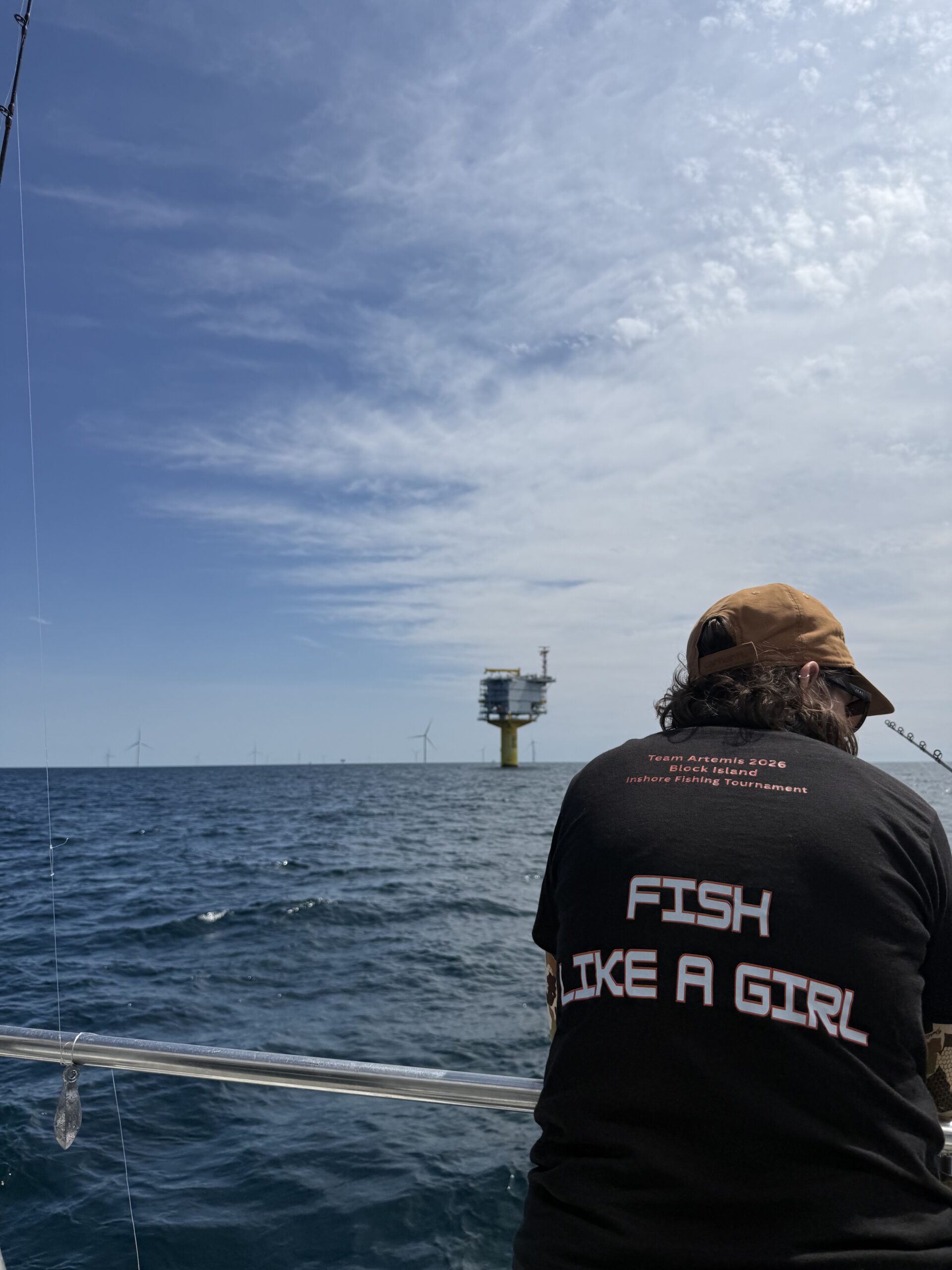 An angler fishing near the substation